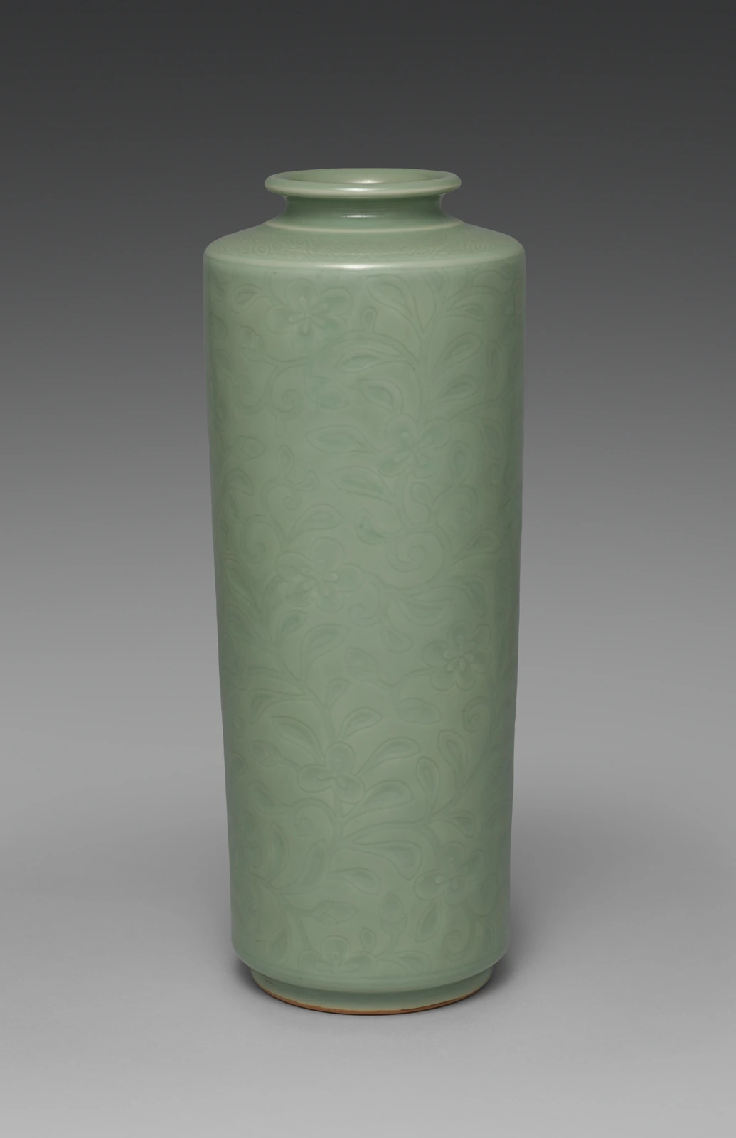 Tong-Shaped Vase with Flowers and Grasses
