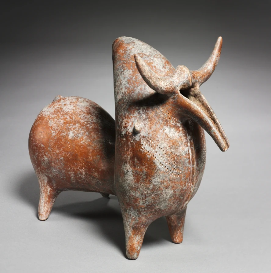 Spouted Zebu Vessel